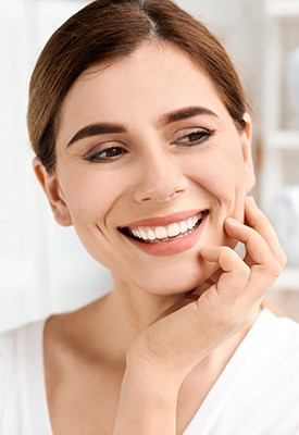 Patient in Shelby smiling after getting veneers
