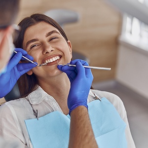 Woman smiling in dentist’s chair