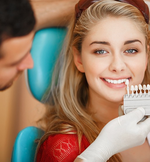 Patient in La Crosse smiling with bright white teeth after professional teeth whitening