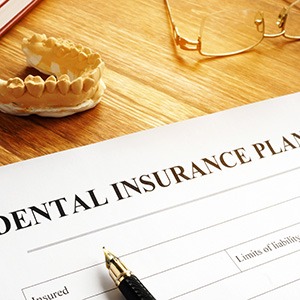Dental insurance benefits form on a table